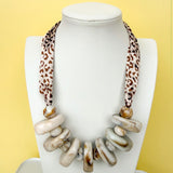 Love Lemon Lane: Cream Resin Disc Leopard Statement Necklace