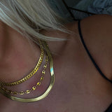 THIN SHINY GOLD NECKLACE (TOP NECKLACE)